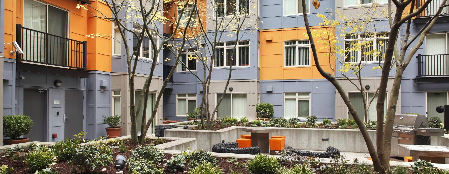 a row of apartments in a courtyard